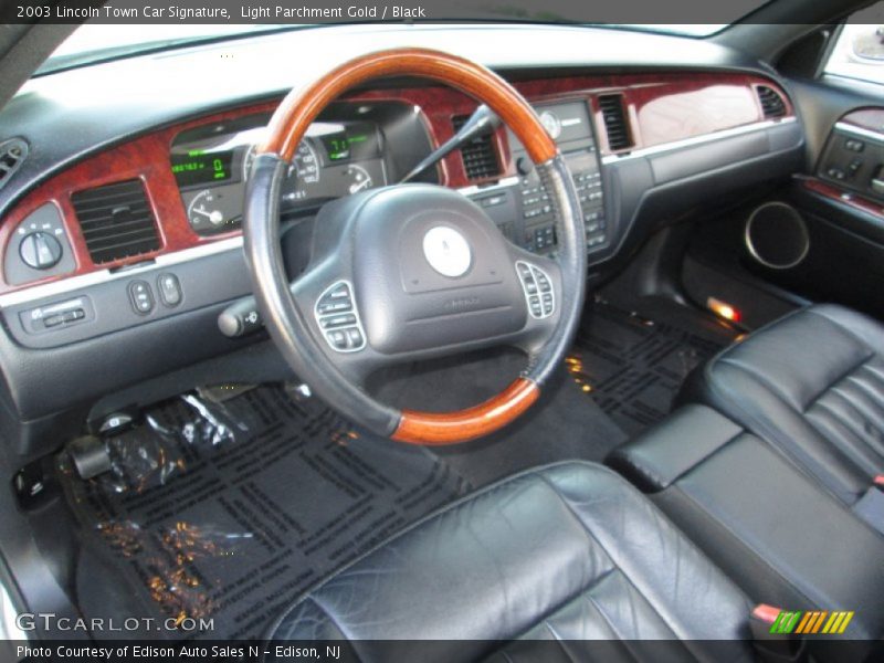 Light Parchment Gold / Black 2003 Lincoln Town Car Signature