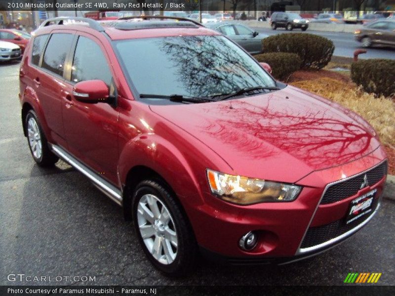 Rally Red Metallic / Black 2010 Mitsubishi Outlander SE 4WD
