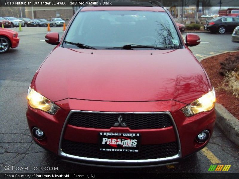Rally Red Metallic / Black 2010 Mitsubishi Outlander SE 4WD