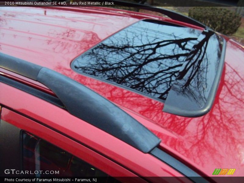 Rally Red Metallic / Black 2010 Mitsubishi Outlander SE 4WD