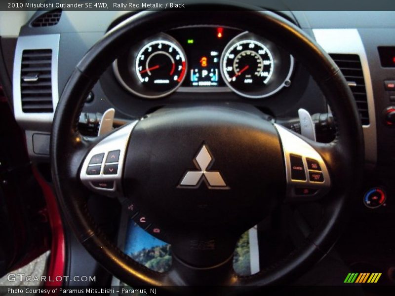 Rally Red Metallic / Black 2010 Mitsubishi Outlander SE 4WD