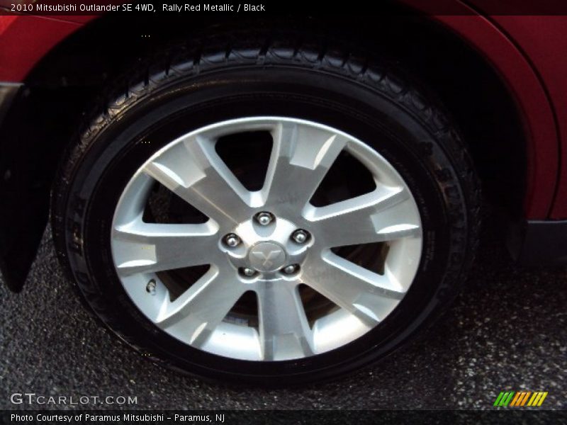 Rally Red Metallic / Black 2010 Mitsubishi Outlander SE 4WD