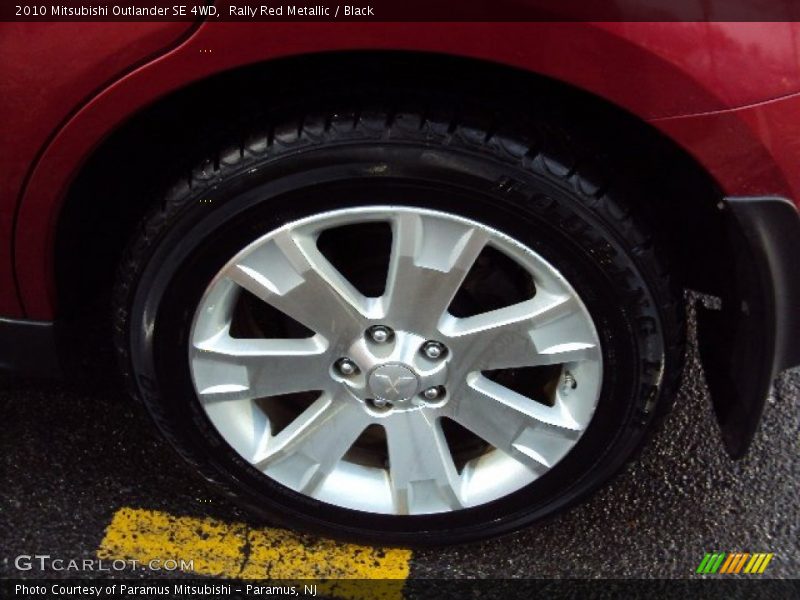 Rally Red Metallic / Black 2010 Mitsubishi Outlander SE 4WD