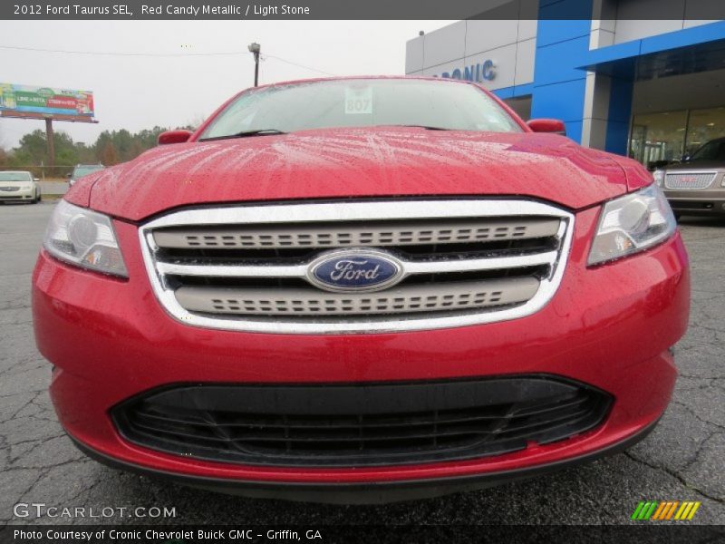 Red Candy Metallic / Light Stone 2012 Ford Taurus SEL