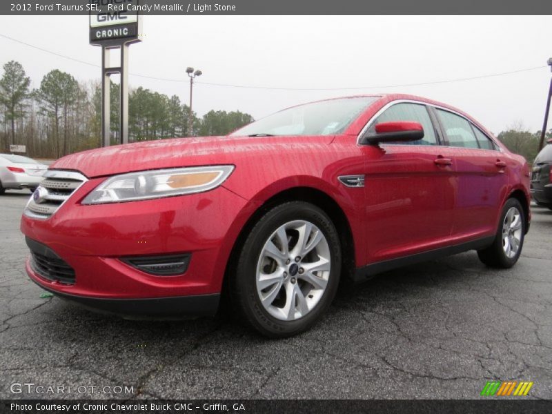 Red Candy Metallic / Light Stone 2012 Ford Taurus SEL