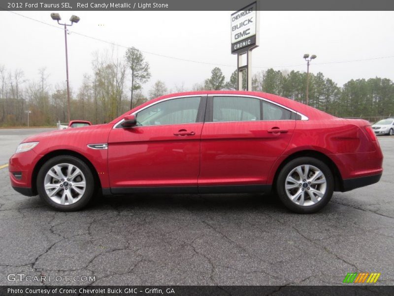Red Candy Metallic / Light Stone 2012 Ford Taurus SEL
