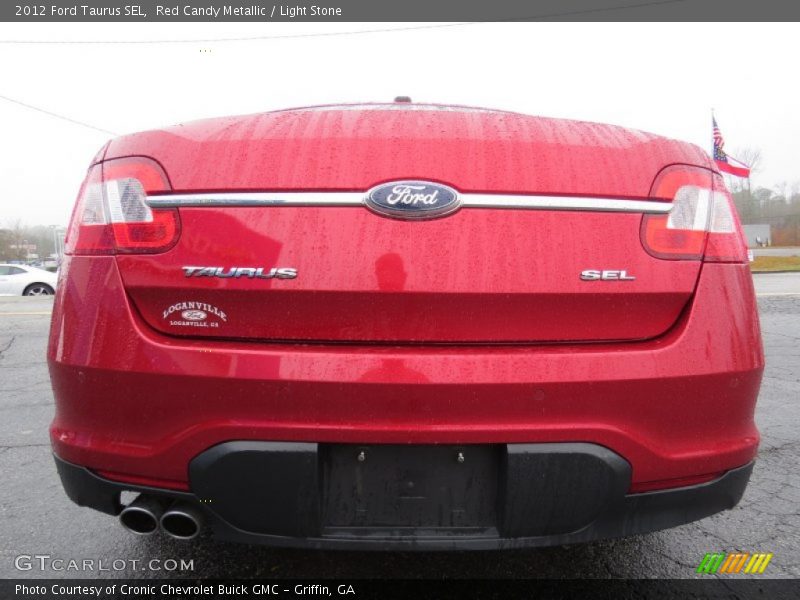 Red Candy Metallic / Light Stone 2012 Ford Taurus SEL