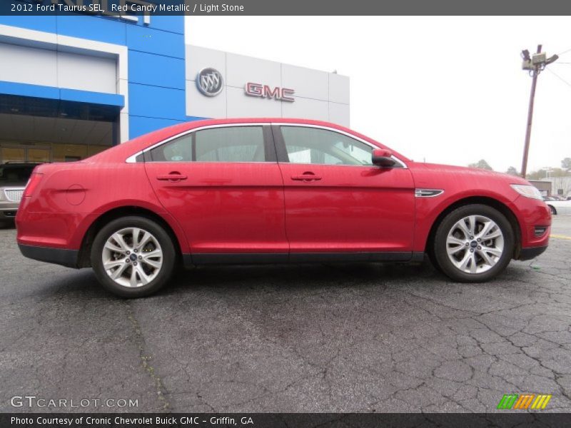 Red Candy Metallic / Light Stone 2012 Ford Taurus SEL