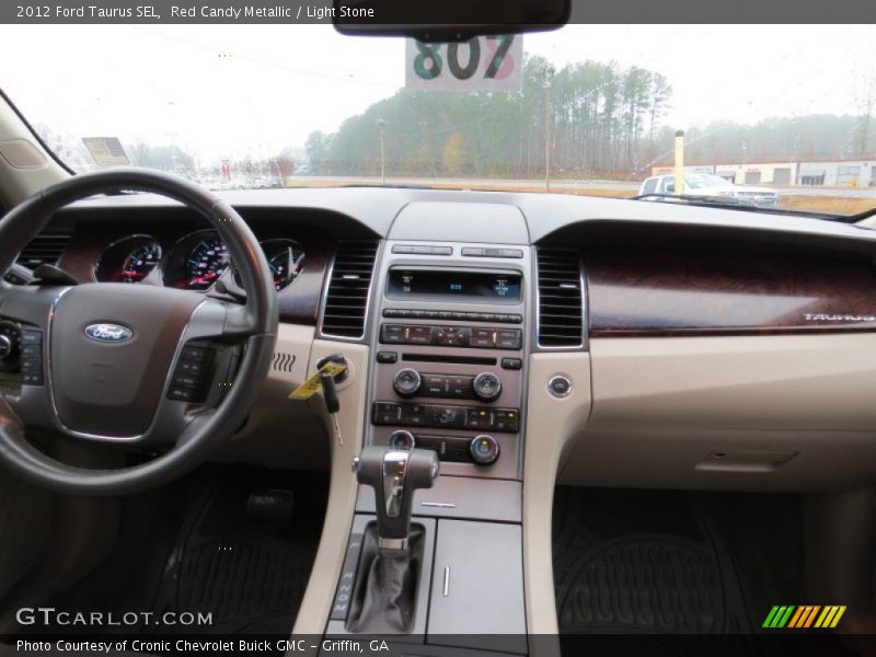 Red Candy Metallic / Light Stone 2012 Ford Taurus SEL