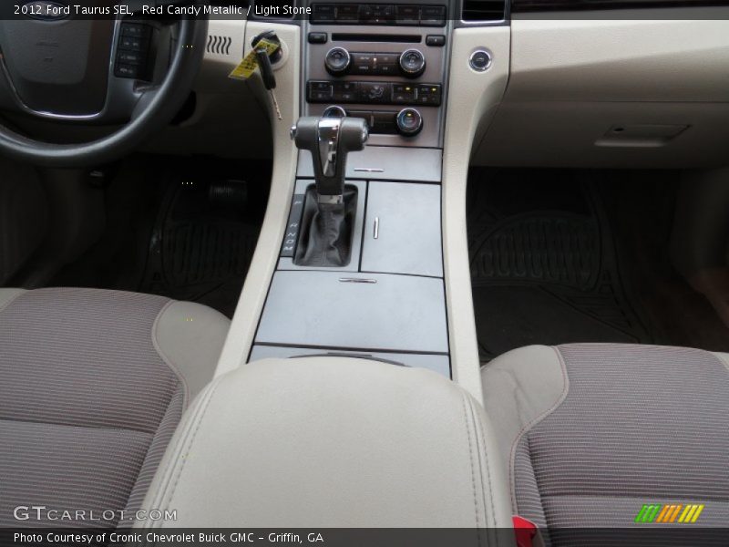 Red Candy Metallic / Light Stone 2012 Ford Taurus SEL
