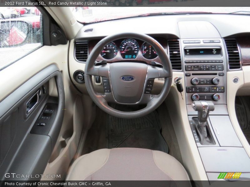 Red Candy Metallic / Light Stone 2012 Ford Taurus SEL