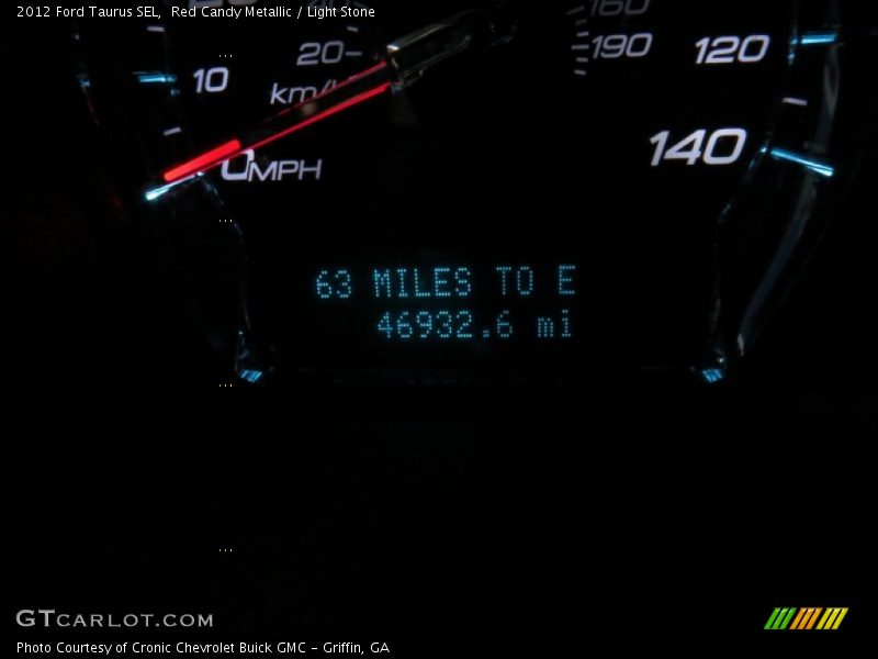 Red Candy Metallic / Light Stone 2012 Ford Taurus SEL