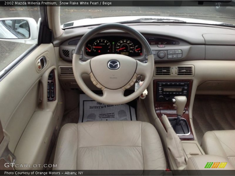 Snow Flake White Pearl / Beige 2002 Mazda Millenia Premium
