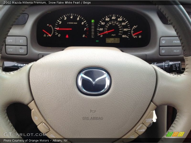 Snow Flake White Pearl / Beige 2002 Mazda Millenia Premium