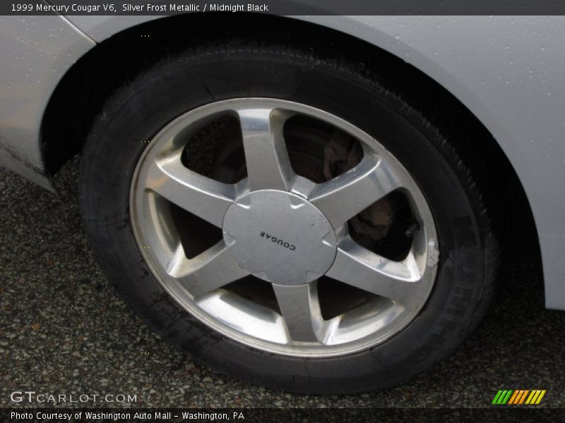 Silver Frost Metallic / Midnight Black 1999 Mercury Cougar V6
