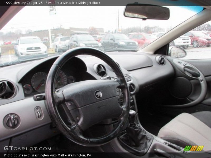 Silver Frost Metallic / Midnight Black 1999 Mercury Cougar V6