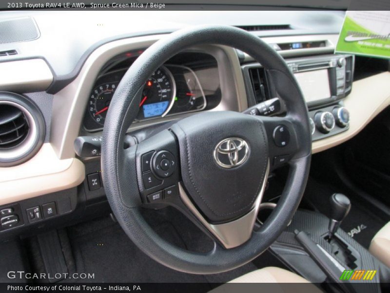 Spruce Green Mica / Beige 2013 Toyota RAV4 LE AWD