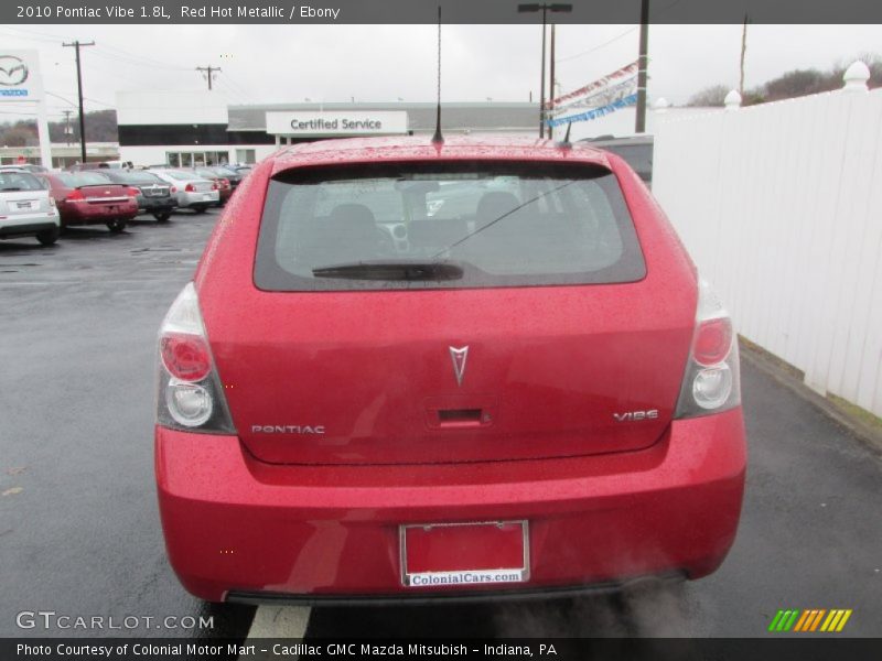 Red Hot Metallic / Ebony 2010 Pontiac Vibe 1.8L