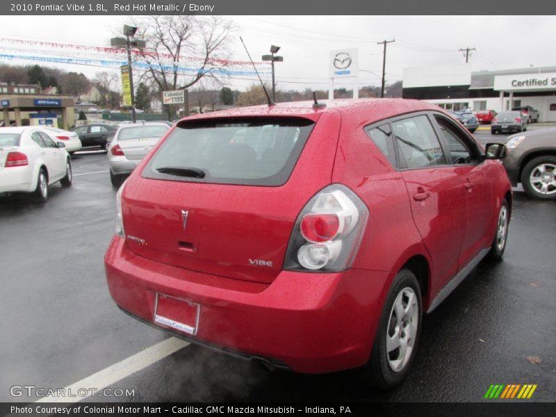 Red Hot Metallic / Ebony 2010 Pontiac Vibe 1.8L