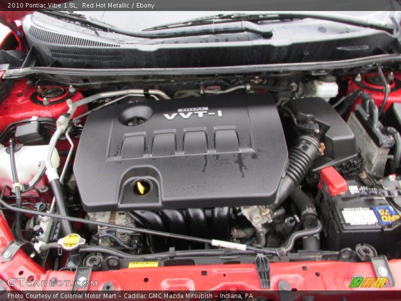 Red Hot Metallic / Ebony 2010 Pontiac Vibe 1.8L