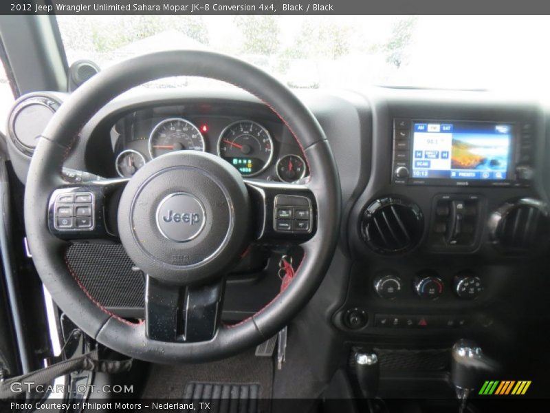Black / Black 2012 Jeep Wrangler Unlimited Sahara Mopar JK-8 Conversion 4x4