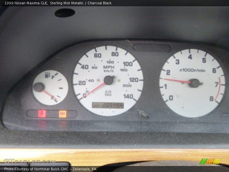 Sterling Mist Metallic / Charcoal Black 1999 Nissan Maxima GLE