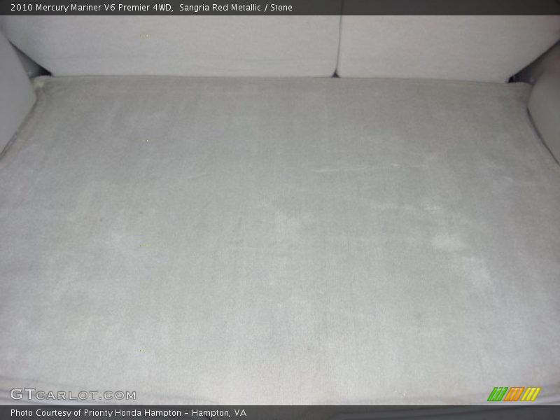Sangria Red Metallic / Stone 2010 Mercury Mariner V6 Premier 4WD