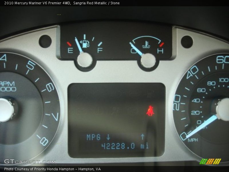 Sangria Red Metallic / Stone 2010 Mercury Mariner V6 Premier 4WD