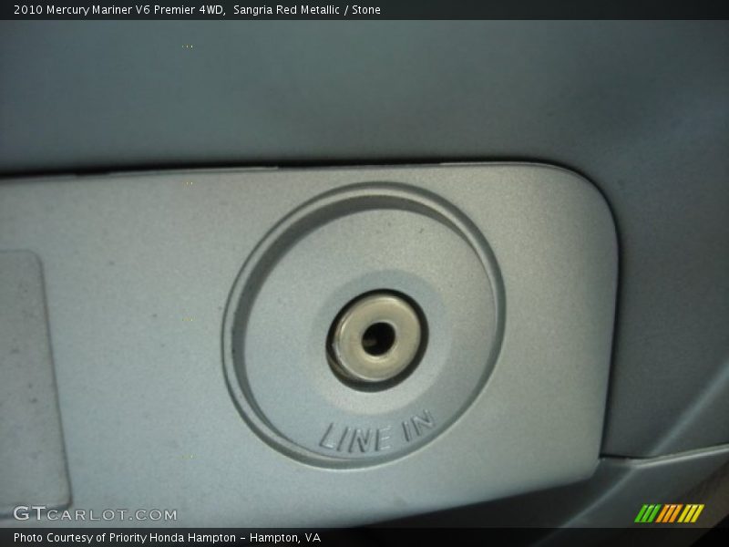 Sangria Red Metallic / Stone 2010 Mercury Mariner V6 Premier 4WD