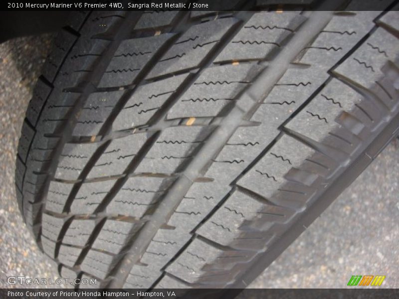 Sangria Red Metallic / Stone 2010 Mercury Mariner V6 Premier 4WD