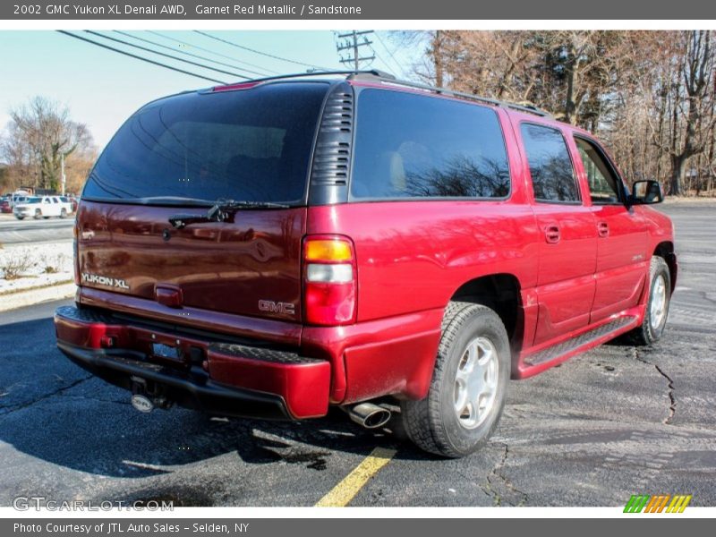 Garnet Red Metallic / Sandstone 2002 GMC Yukon XL Denali AWD
