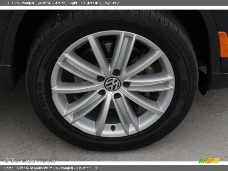 Night Blue Metallic / Clay Gray 2011 Volkswagen Tiguan SE 4Motion