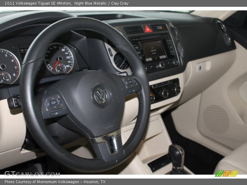 Night Blue Metallic / Clay Gray 2011 Volkswagen Tiguan SE 4Motion