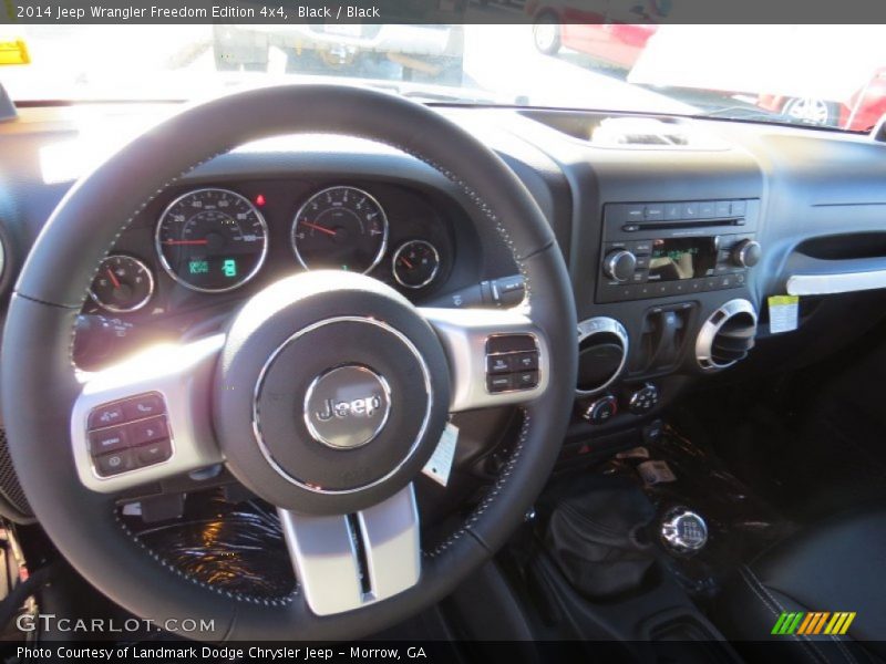 Black / Black 2014 Jeep Wrangler Freedom Edition 4x4