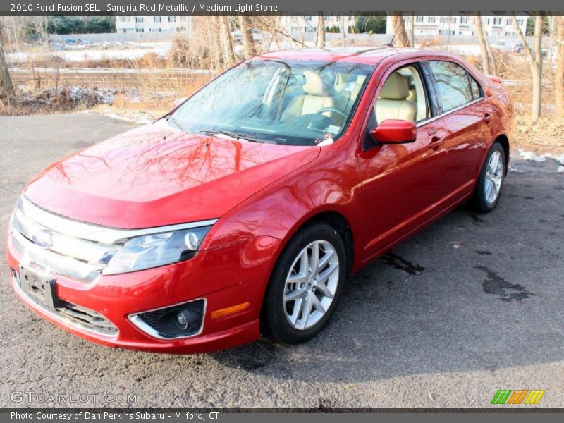 Sangria Red Metallic / Medium Light Stone 2010 Ford Fusion SEL