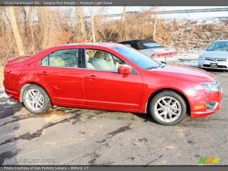Sangria Red Metallic / Medium Light Stone 2010 Ford Fusion SEL