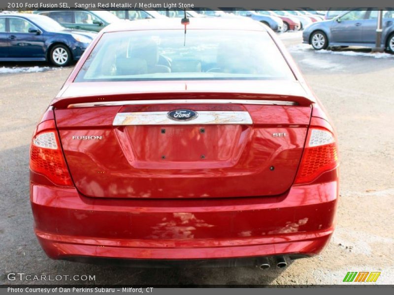 Sangria Red Metallic / Medium Light Stone 2010 Ford Fusion SEL