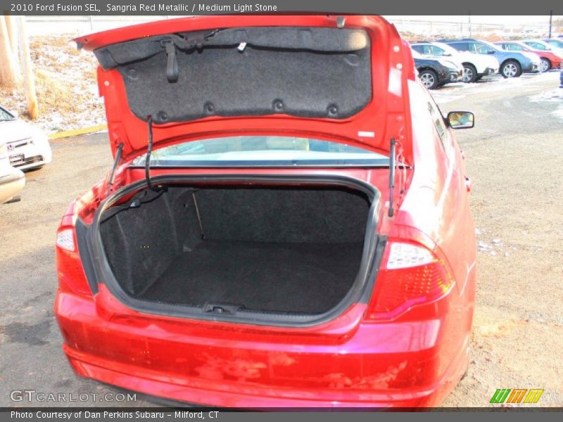 Sangria Red Metallic / Medium Light Stone 2010 Ford Fusion SEL