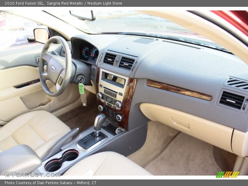 Sangria Red Metallic / Medium Light Stone 2010 Ford Fusion SEL
