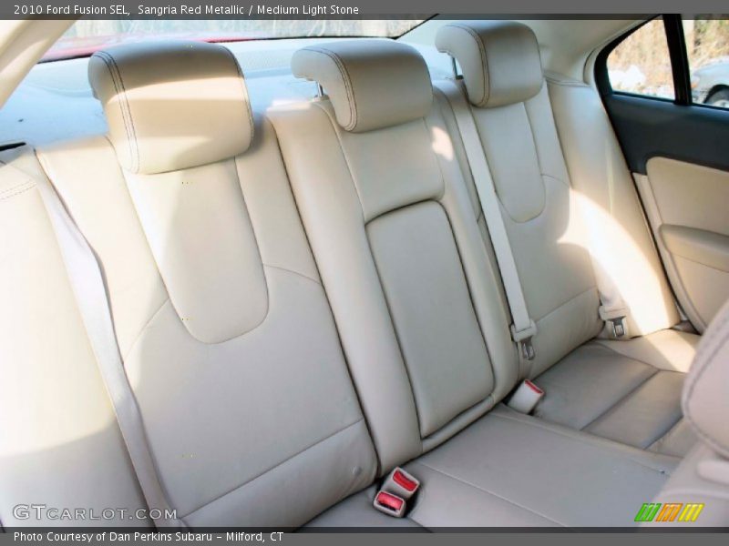 Sangria Red Metallic / Medium Light Stone 2010 Ford Fusion SEL