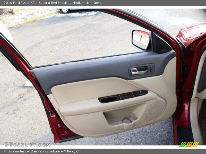 Sangria Red Metallic / Medium Light Stone 2010 Ford Fusion SEL