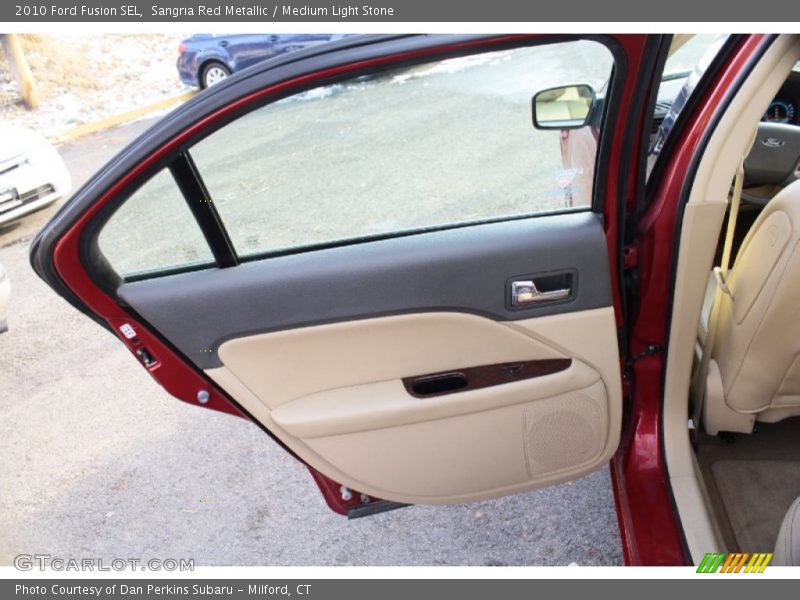 Sangria Red Metallic / Medium Light Stone 2010 Ford Fusion SEL