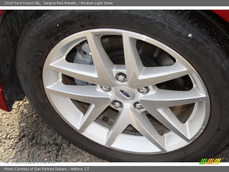 Sangria Red Metallic / Medium Light Stone 2010 Ford Fusion SEL