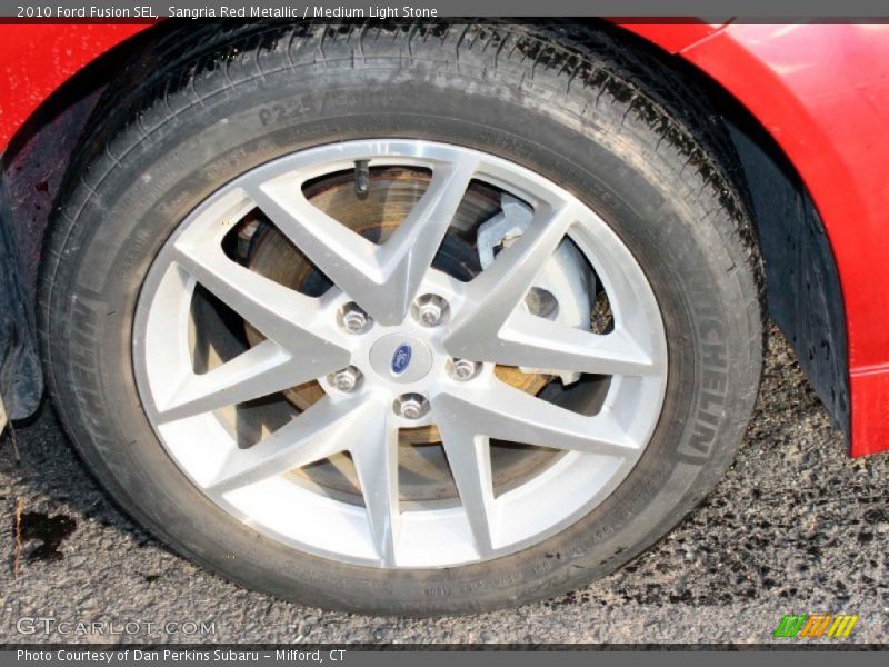Sangria Red Metallic / Medium Light Stone 2010 Ford Fusion SEL