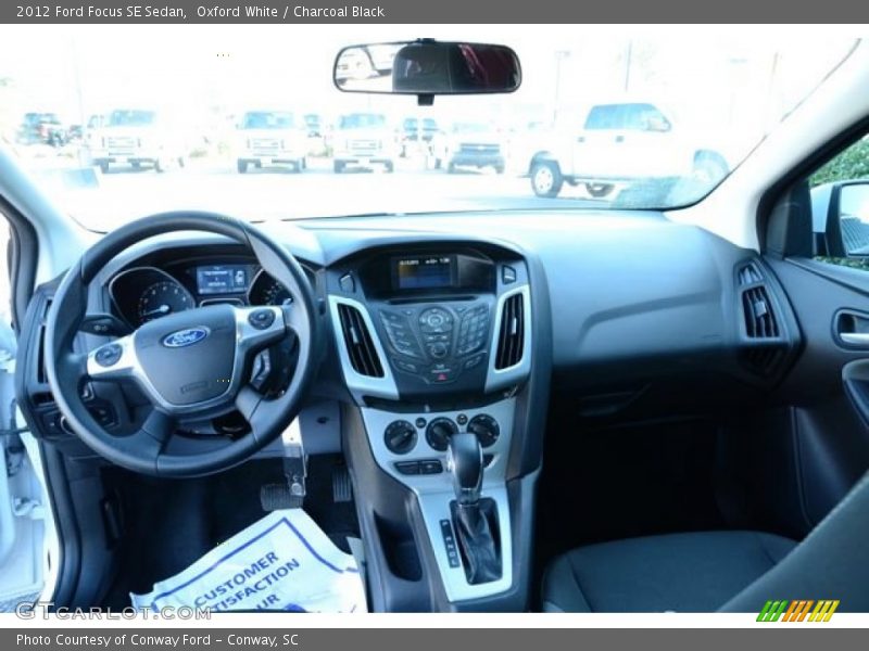 Oxford White / Charcoal Black 2012 Ford Focus SE Sedan