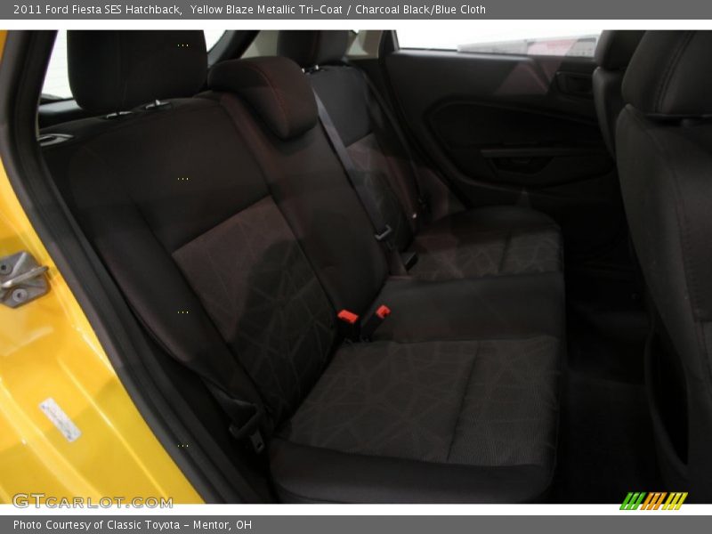 Yellow Blaze Metallic Tri-Coat / Charcoal Black/Blue Cloth 2011 Ford Fiesta SES Hatchback