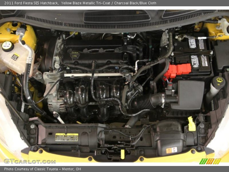 Yellow Blaze Metallic Tri-Coat / Charcoal Black/Blue Cloth 2011 Ford Fiesta SES Hatchback