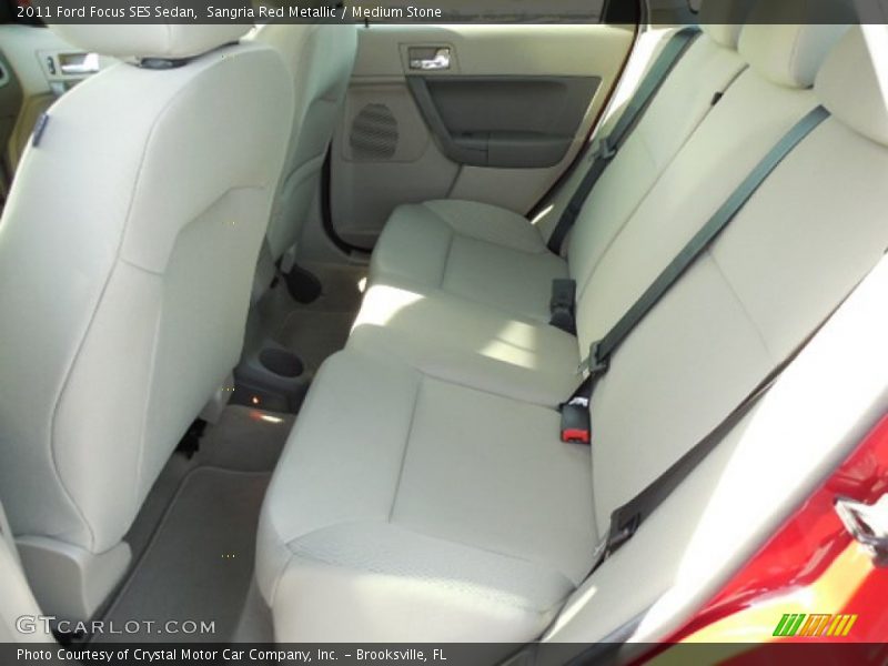 Sangria Red Metallic / Medium Stone 2011 Ford Focus SES Sedan