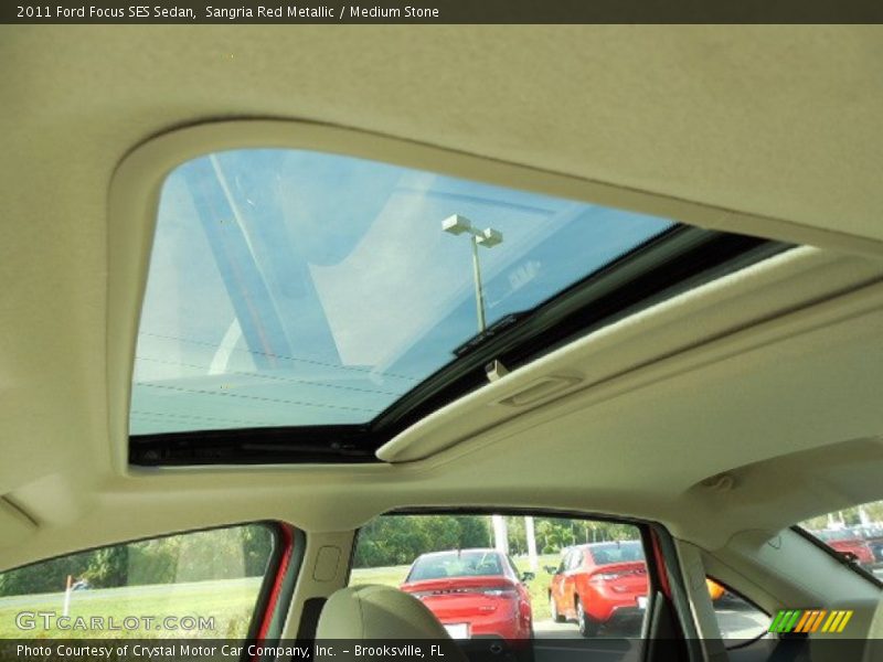 Sangria Red Metallic / Medium Stone 2011 Ford Focus SES Sedan