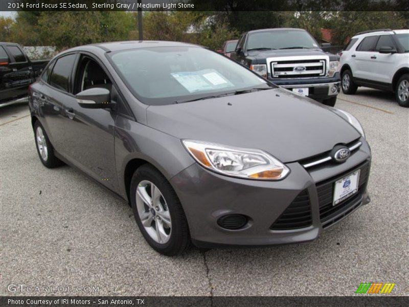 Sterling Gray / Medium Light Stone 2014 Ford Focus SE Sedan